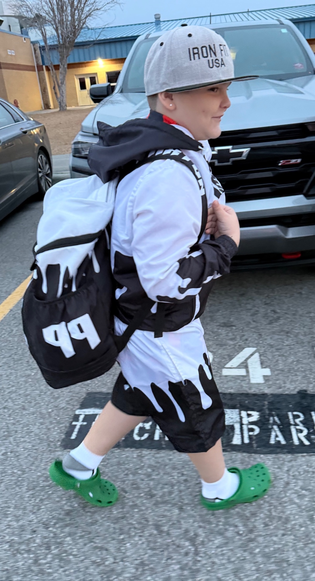 Young fan in custom IF Gameday drip